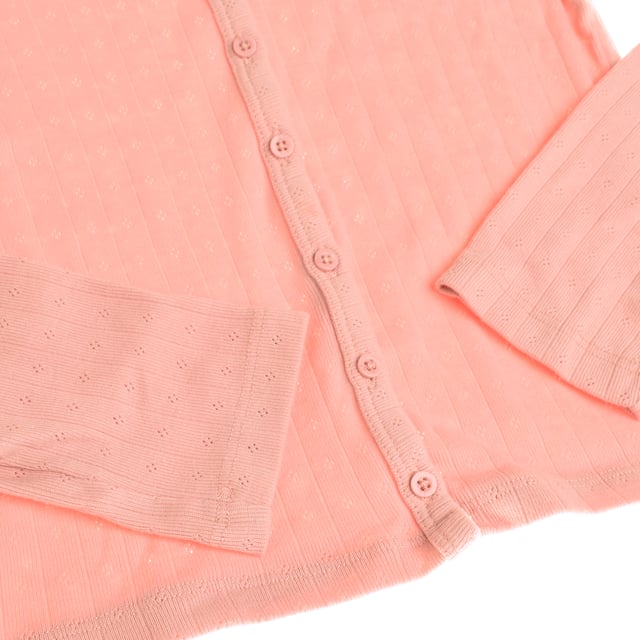 Girl's cardigan with a sweet and sophisticated design, ideal for adding a special touch to any outfit.

 Crafted from a soft, lightweight fabric, it features a delicate openwork dot pattern that adds texture and elegant style.

 The rounded neckline and front button closure allow it to be worn open or closed, adapting to different looks and occasions.

 Its slightly fitted and cropped cut makes it perfect for combining with jeans, skirts or dresses, achieving a balance between comfort and style in the daily life of little ones.
 Composition: 60% Cotton, 40% Polyester
 Care:
- Machine wash max. 30ºC.
 - Use similar colors in the wash.
 - Avoid the use of bleaches.
 - Dry at low temperature.
 - Iron at low temperature.
 - Do not dry clean.