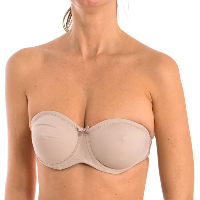 The Lena invisible non-padded underwire bra is designed to offer discreet support and all-day comfort. Its non-padded design enhances the natural shape of the bust, while its invisible structure makes it ideal for tight-fitting clothing.

 Characteristics:
 - Invisible unpadded bra that enhances the natural shape of the bust without being visible under tight clothing.
 - Strapless women's bra, ideal for garments with bare shoulders or sleeveless necklines.
 - Bra with supportive underwire that provides additional support and firmness.
 - Adjustable back closure allows for a custom fit for added comfort.
 - Bra with transparent back, it has a back band made of transparent material that makes it perfect for garments with an open back or made of translucent materials.
 - Includes a small decorative bow in the center, providing a delicate touch.
 - Soft and lightweight fabric that guarantees comfort and breathability.


 The Lena invisible non-padded underwire bra is perfect for women looking for an intimate garment that combines comfort, functionality and style, ensuring a natural and smooth silhouette on any occasion.
 Composition: 84% Polyamide, 16% Elastane
 Care:
Wash at maximum temperature 30º.
 Do not iron.
 Do not use bleach.
 Do not tumble dry.
 Do not dry clean.