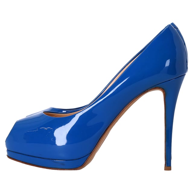 VINTAGE, RRP AS NEW
The Giuseppe Zanotti Peep-Toe Pumps in Blue Patent Leather exude bold sophistication and modern luxury. Crafted from high-shine blue patent leather, these pumps feature a sleek peep-toe design and a stiletto heel, offering a perfect blend of elegance and edge. The striking blue hue adds a pop of color to any outfit, while the iconic Giuseppe Zanotti craftsmanship ensures a comfortable fit and lasting style. These pumps are the ideal choice for making a statement at any event.

Styling Tip: Pair these stunning pumps with tailored black trousers and a crisp white shirt for a refined, fashion-forward look. For a more relaxed outfit, combine them with dark denim and a fitted jacket for a modern, casual chic vibe. The bold blue color makes them a statement piece, so keep accessories minimal and let the shoes do the talking.

 Giuseppe Zanotti Peep-Toe Pumps in Blue Patent Leather

Condition: Very good
Signs of wear: No visible sign of wear. No Mark at insole., Lightly used but very well maintained. Minor mark at soles & creasing, light scuffing at the soles and heels.
Packaging: Dust bag
Color: Blue | blue
Material: Leather | patent leather
Size: IT | 39
Measurements: Heel height: 120; Insole length: 250
SKU: NAPPUDESH457672W