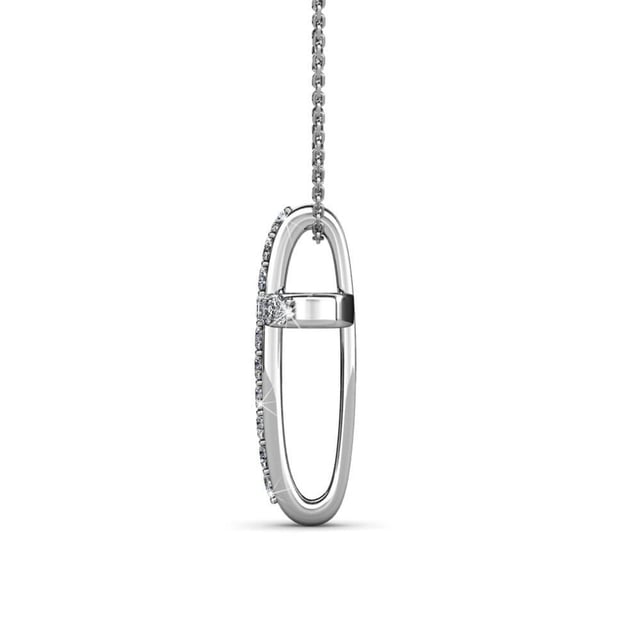 Samenstelling: Messing Afwerking: Rhodium geplateerd Soort steen: Oostenrijks kristal Aantal stenen (st.): 21 Kleur steen: Kristal Lengte ketting (mm): 400 + 50