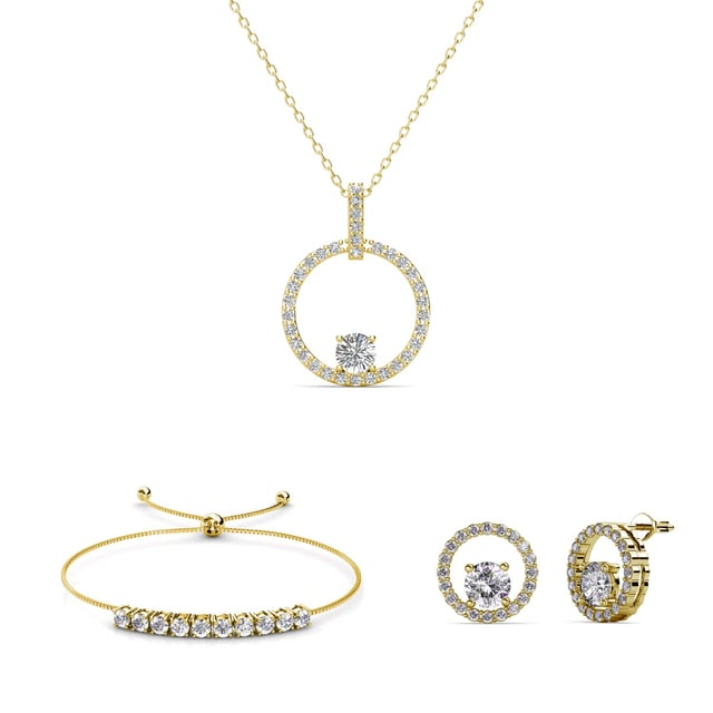 Samenstelling: Messing Afwerking: 18k verguld Steensoort: Oostenrijks kristal Steensoort: Witte zirkoon Aantal stenen (stuks): 86 Steenkleur: Kristal Lengte ketting: Lengte ketting (mm): 400 + 50 Diameter oorbellen (mm): 14 Lengte armband (mm): 245
