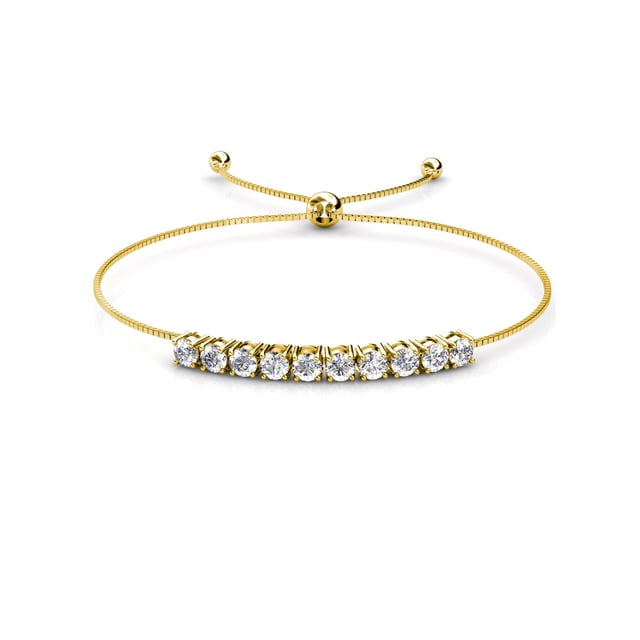 Samenstelling: Messing Afwerking: 18k verguld Steensoort: Oostenrijks kristal Steensoort: Witte zirkoon Aantal stenen (stuks): 86 Steenkleur: Kristal Lengte ketting: Lengte ketting (mm): 400 + 50 Diameter oorbellen (mm): 14 Lengte armband (mm): 245