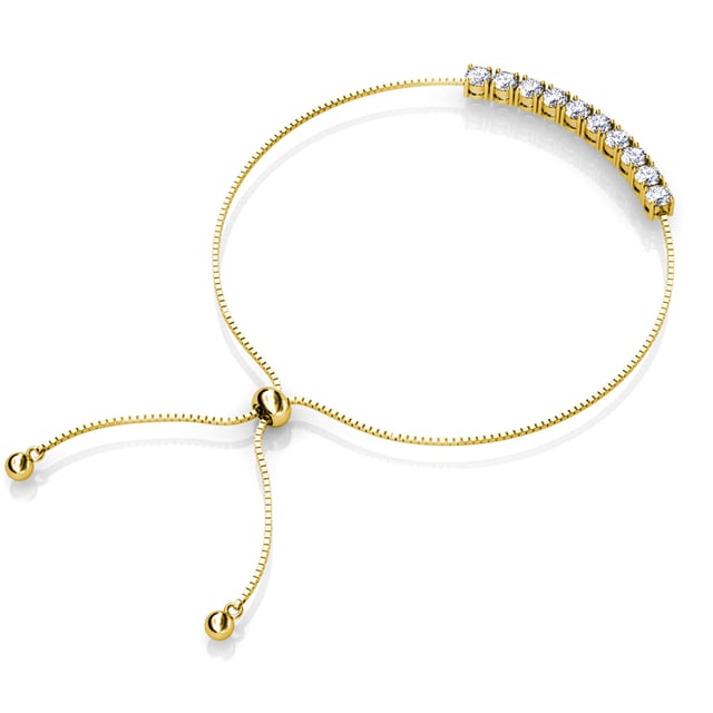 Samenstelling: Messing Afwerking: 18k verguld Steensoort: Oostenrijks kristal Steensoort: Witte zirkoon Aantal stenen (stuks): 86 Steenkleur: Kristal Lengte ketting: Lengte ketting (mm): 400 + 50 Diameter oorbellen (mm): 14 Lengte armband (mm): 245