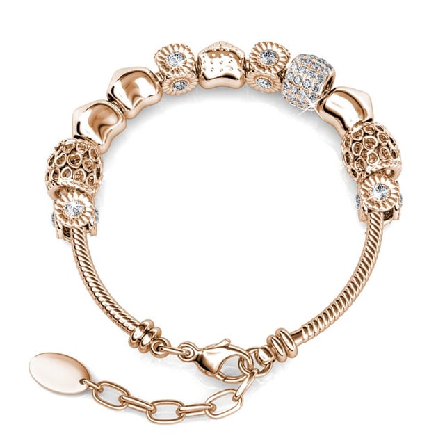 Composition : Laiton
Finition : Plaqué Or Rose 18k
Type de Pierre : Cristal d'Autriche
Nombre de pierre (pces) : 64
Couleur de la pierre : Cristal
Longueur (mm) : 225 + 25