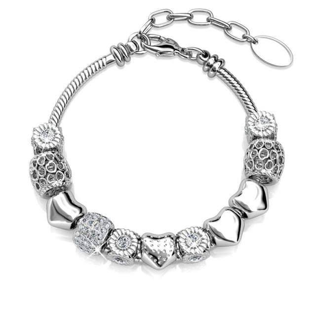 Samenstelling: Messing Afwerking: Rhodium geplateerd Steensoort: Oostenrijks kristal Aantal stenen (st.): 64 Steenkleur: Kristal Lengte (mm): 225 + 25