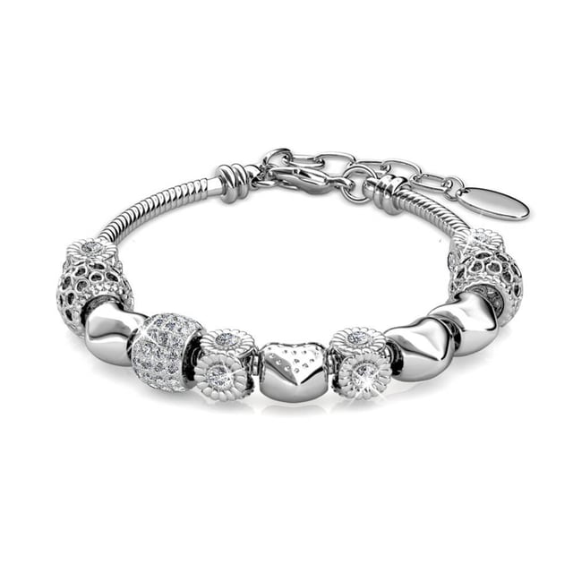 Samenstelling: Messing Afwerking: Rhodium geplateerd Steensoort: Oostenrijks kristal Aantal stenen (st.): 64 Steenkleur: Kristal Lengte (mm): 225 + 25