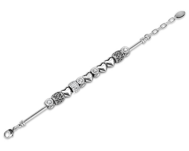 Samenstelling: Messing Afwerking: Rhodium geplateerd Steensoort: Oostenrijks kristal Aantal stenen (st.): 64 Steenkleur: Kristal Lengte (mm): 225 + 25