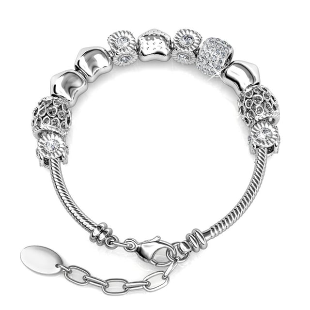 Samenstelling: Messing Afwerking: Rhodium geplateerd Steensoort: Oostenrijks kristal Aantal stenen (st.): 64 Steenkleur: Kristal Lengte (mm): 225 + 25