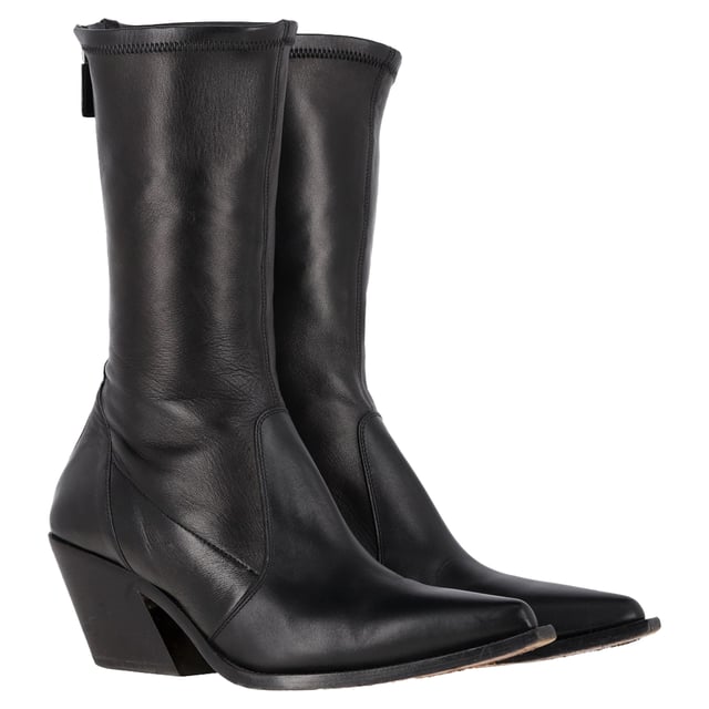 VINTAGE, RRP AS NEW
The Givenchy Slant-Heel Mid-Calf Boots in black leather are a bold and modern statement piece that combines luxury with contemporary edge. Crafted from smooth black leather, these boots feature a distinctive slanted heel that adds a unique architectural element to their sleek design. The mid-calf length offers versatility, making them perfect for both casual and dressed-up looks. With their refined silhouette and edgy details, these boots are ideal for those who want to elevate their footwear collection with a touch of sophistication and attitude.

Styling Tip:
Pair the Givenchy Slant-Heel Mid-Calf Boots with tailored trousers or a midi skirt for a chic and balanced look. For a more casual vibe, wear them with skinny jeans or a leather jacket. These boots also pair perfectly with a sleek, form-fitting dress, adding a strong contrast that brings an edgy element to a feminine silhouette. Whether dressed up or down, the unique slanted heel is sure to make a stylish statement wherever you go.

 Givenchy Slant-Heel Mid-Calf Boots in Black Leather

Condition: Very good
Signs of wear: Minor markings, Lightly used but very well maintained. Minor mark at soles & creasing, light scuffing at the soles and heels.
Packaging: None
Color: Black
Material: Leather | leather
Size: IT | 39
Measurements: Heel height: 60; Insole length: 250
SKU: NAPPUGBSH457178W