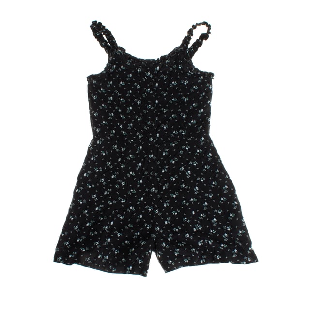 This short jumpsuit for girls stands out for its comfortable and versatile design, ideal for everyday wear.

 The straps feature gathered details, adding a fun and elegant touch.

 The loose fit allows for freedom of movement, while the gathered fit at the top ensures comfort.

 In addition, it has a practical button closure at the back, making it easy to put on and take off.

 It is a perfect option to maintain a modern and fresh style on any occasion.
 Composition: Exterior: 100% Viscose; Interior: 100% Viscose
 Care:
- Machine wash cold on delicate cycle.
 - Use mild detergents.
 - Use dryer at low temperature.
 - Iron at low temperatures.
 - Do not dry clean.