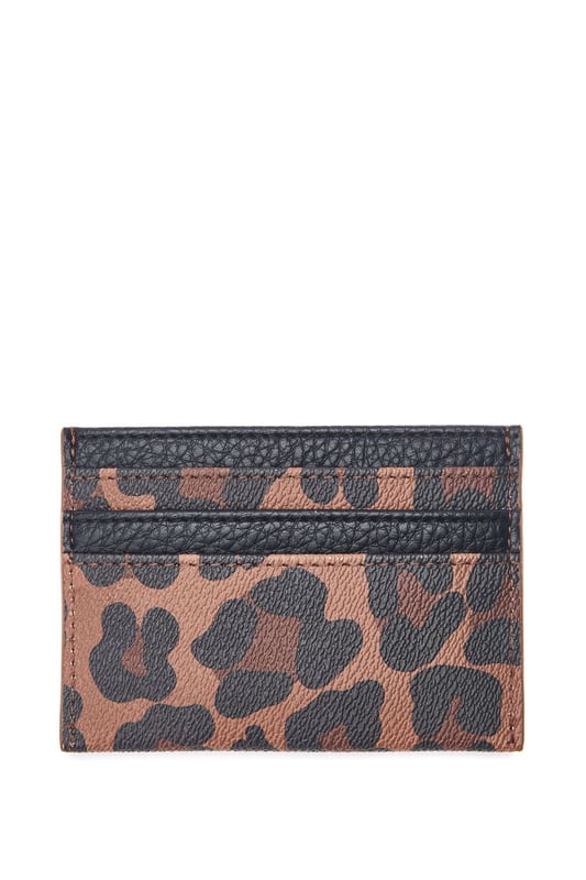 Looking for the perfect gift for a loved one or yourself? Meet Ali, our double sided card holder featuring 6 exterior card slots and on central slot with leopard lining for a pop of something special to the design. This cardholder comes with a Moda gift box.