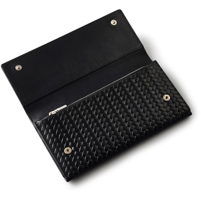 Womens black Radley westwell lane purse, manufactured with leather. Featuring: popper closure, zip section, card compartments, protective dust bag and height 10cm x width 19cm x depth 2cm.