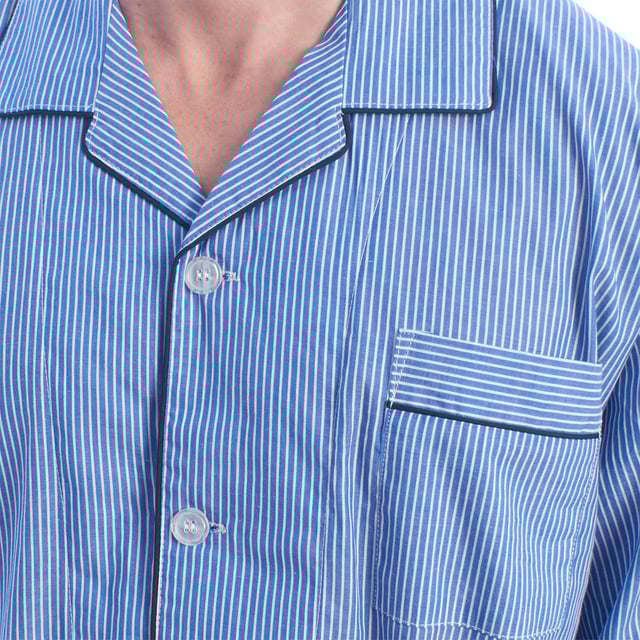 Kisses&Love men's pajamas. Classic men's pajamas made from premium poplin fabric!

 This men's pyjama set combines a long-sleeved shirt and long trousers. Made from soft, breathable materials, it ensures comfort all night long. Ideal for autumn/winter due to its length but also suitable for use all year round, this set offers a perfect balance between style and comfort for a restful night's sleep.

 Exclusive designs and a variety of prints: Men's pajamas are available in different colors of stripes and checks, allowing you to choose between different styles that reflect your personality and taste. From vibrant colors to softer ones, each pajama offers a unique and special touch.

 Easy Care & Durability: Made from durable cotton, the men's cotton pajamas are easy to machine wash and maintain their softness, color and shape wash after wash. This easy maintenance ensures that the pajamas remain a favorite item in your wardrobe, offering durability and practicality over time, especially during the colder seasons.

 Men's pajamas, the perfect gift for Mother's Day, anniversary, Christmas, New Year, birthday, and much more!

 Choose style, quality and comfort with Kisses&Love!
 Composition: 100% Cotton
 Care:
- Wash at max temperature. 30º.
 - Do not use bleach.
 - Do not use a dryer.
 - Iron at low temperature max. 110º.
 - Do not dry clean.