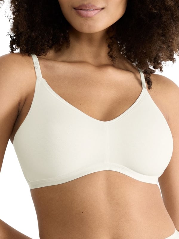 Sloggi GO Daily Cotton Soft Bra. The GO Daily Cotton collection uses certified organic cotton for smooth stretchy everyday underwear. Non-wired soft cup bra with hook & eye closure, adjustable straps and high cotton content. Product is machine washable.