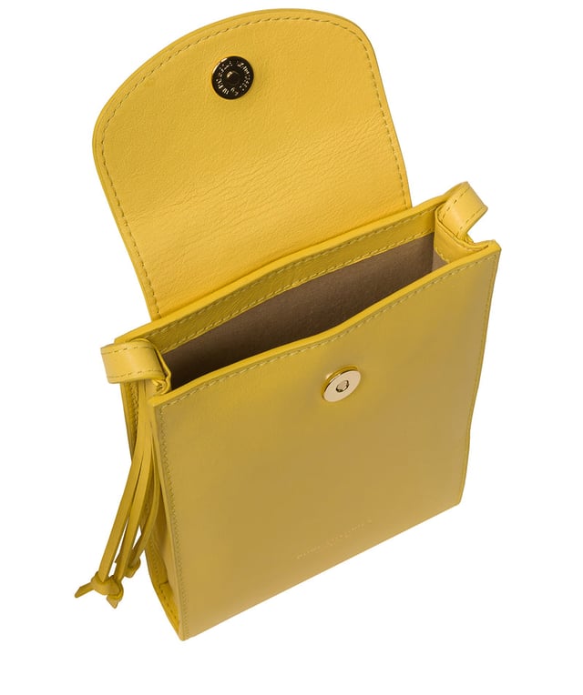 The 'Kiana' cross body phone bag from the Pure Luxuries Marylebone Collection is handcrafted from high-quality, genuine Nappa leather with a natural super-soft touch. The minimalistic fold-over top is secured by a gold-coloured magnetic press stud. This practical design is the perfect place to keep your phone safe and features a tassel design on the exterior. Lined with 100% cotton for a flawless finish and comes with a matching and adjustable slim leather strap with a maximum drop length of 65cm. The minimalist Pure Luxuries logo is embossed in gold foil for a beautifully simple finishing touch.