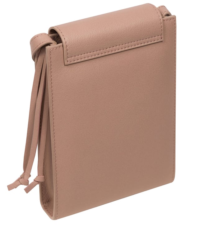 The 'Kiana' cross body phone bag from the Pure Luxuries Marylebone Collection is handcrafted from high-quality, genuine Nappa leather with a natural super-soft touch. The minimalistic fold-over top is secured by a gold-coloured magnetic press stud. This practical design is the perfect place to keep your phone safe and features a tassel design on the exterior. Lined with 100% cotton for a flawless finish and comes with a matching and adjustable slim leather strap with a maximum drop length of 65cm. The minimalist Pure Luxuries logo is embossed in gold foil for a beautifully simple finishing touch.
