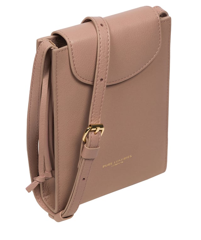 The 'Kiana' cross body phone bag from the Pure Luxuries Marylebone Collection is handcrafted from high-quality, genuine Nappa leather with a natural super-soft touch. The minimalistic fold-over top is secured by a gold-coloured magnetic press stud. This practical design is the perfect place to keep your phone safe and features a tassel design on the exterior. Lined with 100% cotton for a flawless finish and comes with a matching and adjustable slim leather strap with a maximum drop length of 65cm. The minimalist Pure Luxuries logo is embossed in gold foil for a beautifully simple finishing touch.