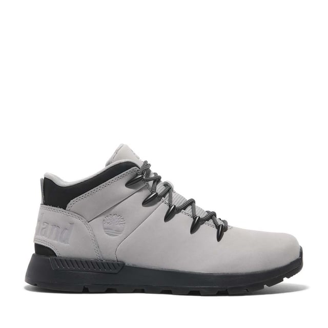 Timberland Sprint Trekker Mid Lace-Up Trainers in grey.- Upper made with Premium Timberland® Leather and ReBOTL™ fabric containing 50% recycled PET plastic.- Lace-up style.- Compression-molded EVA midsole.- OrthoLite® footbed.- ReBOTL™ fabric lining containing 50% recycled PET plastic.- Rubber lug outsole.- Ref: A6DQDEM01