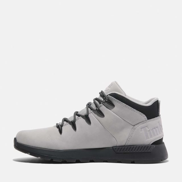 Timberland Sprint Trekker Mid Lace-Up Trainers in grey.- Upper made with Premium Timberland® Leather and ReBOTL™ fabric containing 50% recycled PET plastic.- Lace-up style.- Compression-molded EVA midsole.- OrthoLite® footbed.- ReBOTL™ fabric lining containing 50% recycled PET plastic.- Rubber lug outsole.- Ref: A6DQDEM01