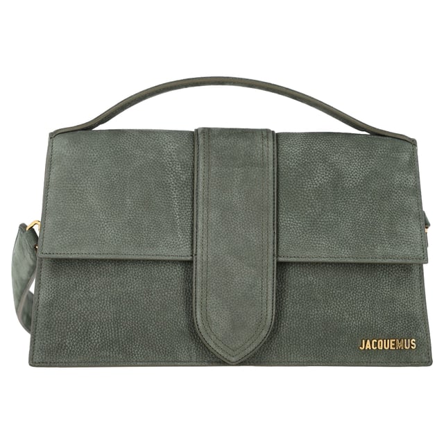 VINTAGE, RRP AS NEW
The Jacquemus La Montagne Le Grand Bambino Bag in Green Leather is a chic and practical addition to any wardrobe. Crafted from premium cowhide suede, this bag boasts a structured silhouette that enhances its sophisticated charm. The fold-over flap with a magnetic snap ensures easy access, while the patch interior pockets provide convenient storage for essentials. It features polished gold-tone hardware, adding a luxurious touch. With an optional, adjustable strap, this bag can be worn crossbody or over the shoulder, making it versatile for any occasion. The textile lining completes the design, offering a refined finish.




Jacquemus La Montagne Le Grand Bambino Bag in Green Leather