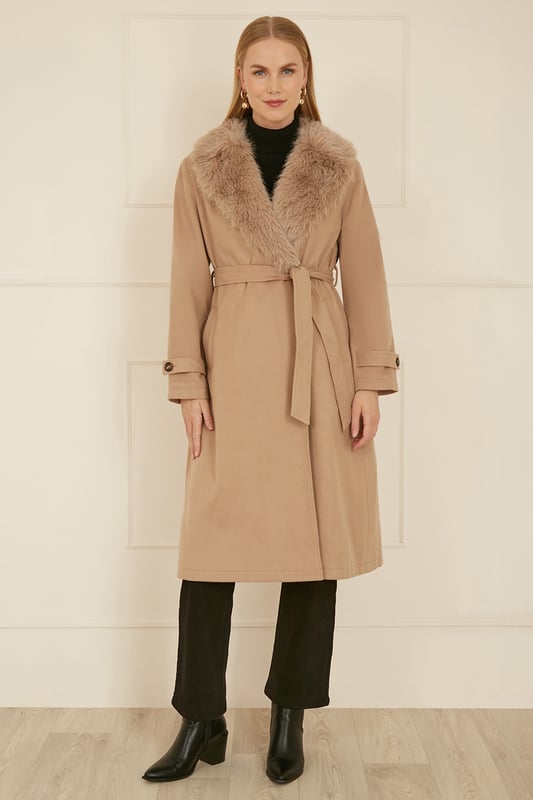 Winter is coming and we couldn't be more excited for coat season! This wrap around beauty with faux fur collar is super versatile, and looks stunning, Pockets and a tie belt ensure this coat is not only chic, but practical too In a midi length to keep you cosy.