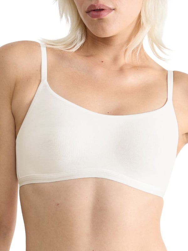 Sloggi GO Daily Cotton Top. The GO Daily Cotton collection uses certified organic cotton for smooth stretchy everyday underwear. Non-wired bralette with pullover design and high cotton content. Product is machine washable.