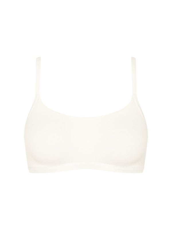 Sloggi GO Daily Cotton Top. The GO Daily Cotton collection uses certified organic cotton for smooth stretchy everyday underwear. Non-wired bralette with pullover design and high cotton content. Product is machine washable.