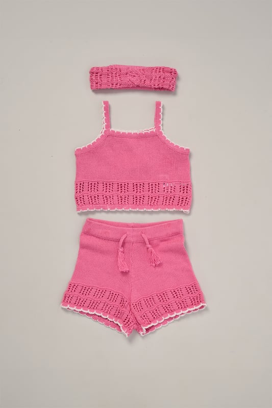This adorable set by Miss includes a true knit top, comfy shorts, and a matching headband. Perfect for warm days, it combines style and practicality, making it an ideal choice for playdates, outings, or casual summer looks.