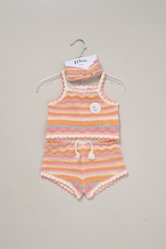 This adorable set by Miss includes a true knit top, comfy shorts, and a matching headband. Perfect for warm days, it combines style and practicality, making it an ideal choice for playdates, outings, or casual summer looks.