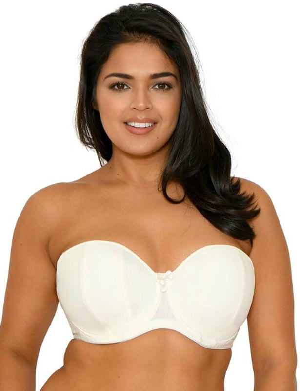 The Curvy Kate Luxe strapless bra is a multi-way bra that can be worn strapless, halterneck or racerback style giving you 3 bra's in 1. The Luxe range is designed with a smooth fabric so it can be worn and hidden under any outfit and is finished with a two tone pinstripe around the band. The strapless bra offers great support through to HH cup and contains a silicone grip around the back band for added security and support.