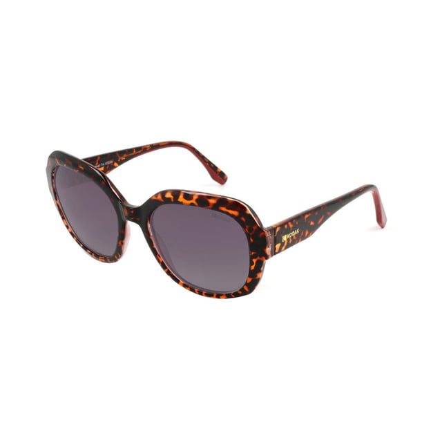 These Kodak women's sunglasses combine a classic and modern design with discreet details that add sophistication.

 Shape and design:
 - The shape of these sunglasses is oval and voluminous, which gives them a retro and elegant design.

 Frame Material:
 - The frame of these sunglasses is made of polycarbonate, a material known for its impact resistance and lightness.

 Sideburns:
 - The temples are also made of polycarbonate, matching the frame material.

 Brand details:
 - Kodak branding on temples.

 Glasses:
 - Polarized: Yes.
 - Progression: Yes, compatible with progressive lenses.
 - Graduation: Yes, adaptable to your visual needs.
 - 100% UV400 protection.

 The color of the sunglasses lenses may vary slightly from the images due to lighting effects or adjustments in the material finish, but they will always retain their style and quality!
 Measures: Lens height: 48 mm. Lens width: 54 mm. Bridge: 19 mm. Temples: 145 mm.
 Composition: Polycarbonate
 Care:
Use a microfiber cloth to clean the lenses and avoid scratches.