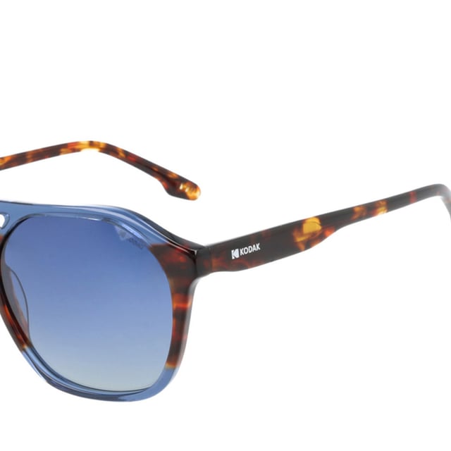 These Kodak men's sunglasses combine a classic, modern design with discreet details that add sophistication.

 Shape and design:
 - These Kodak men's sunglasses feature a hexagonal design with soft edges, combining geometric and rounded lines.
 - Double bridge.

 Frame Material:
 - Made from acetate, a lightweight, durable and excellent quality material, these sunglasses offer comfort and a refined finish.

 Sideburns:
 - The temples are also made of acetate, matching the frame material.

 Brand details:
 - Kodak branding on temples.

 Glasses:
 - Polarized: Yes.
 - Progression: Yes, compatible with progressive lenses.
 - Graduation: Yes, adaptable to your visual needs.
 - 100% UV400 protection.

 The color of the sunglasses lenses may vary slightly from the images due to lighting effects or adjustments in the material finish, but they will always retain their style and quality!
 Measures: Lens height: 46 mm. Lens width: 54 mm. Bridge: 21 mm. Temples: 145 mm.
 Composition: Acetate
 Care:
Use a microfiber cloth to clean the lenses and avoid scratches.