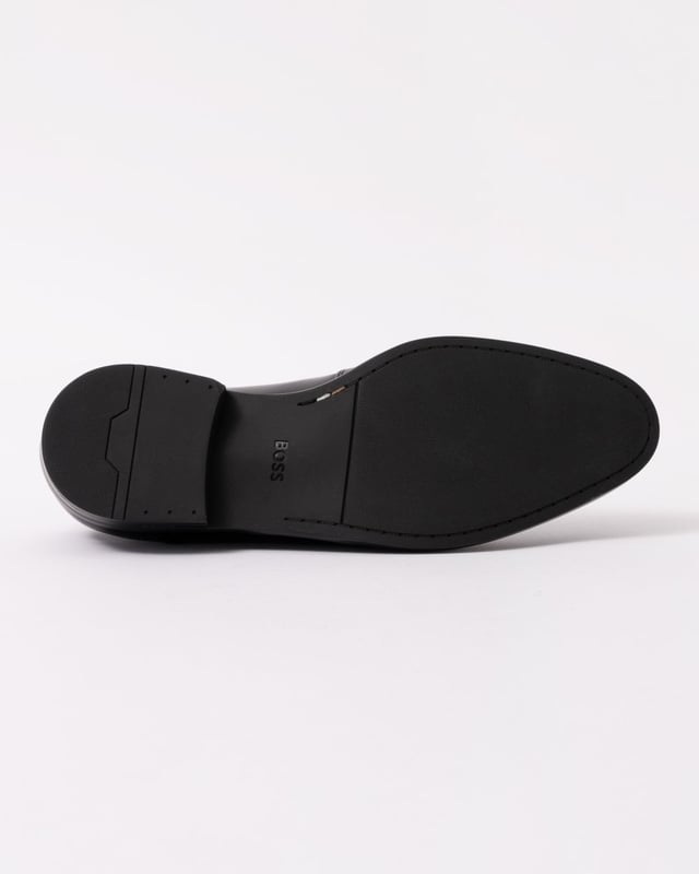Featuring smooth leather uppers with intricate stitching, these BOSS Menswear Derby shoes are a refined formal touch. Durable heel with embossed logo. 

Laces
Fully lined
Packaging: Box

Upper material: 100% Cow skin, Lining: 50% Polyurethane, 95% Polyester, 50% Polyester, 5% Polyurethane, Sole: 100% Thermoplastic polyurethane, Innersole: 95% Polyester, 5% Polyurethane 
50541701