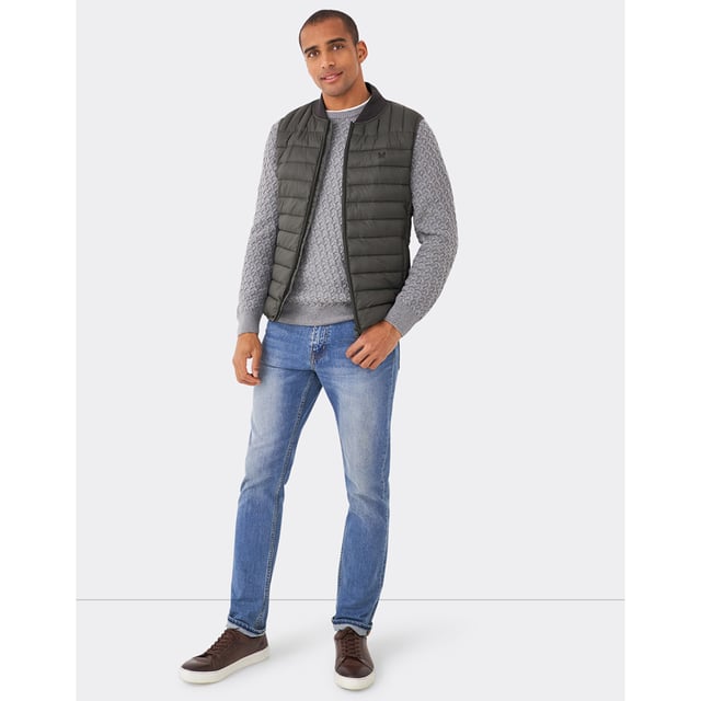 A must-have gilet. Cushioned to keep the heat in with a funnel neck, two pockets and an exposed zip pull, it’s filled with a feather-free wadding that’s as cosy as it is lightweight. Layer over a jumper.
