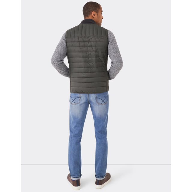 A must-have gilet. Cushioned to keep the heat in with a funnel neck, two pockets and an exposed zip pull, it’s filled with a feather-free wadding that’s as cosy as it is lightweight. Layer over a jumper.