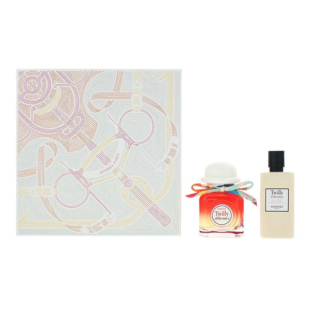 Hermes Twilly D'Hermes Tutti 2 Piece Gift Set includes the elegant Eau De Parfum and a nourishing Moisturizing Body Lotion. The fragrance is a vibrant and playful blend of litchi at the top, bringing a fresh, fruity sweetness. The heart reveals the delicate and spicy essence of ginger flower, which adds warmth and depth. Finally, the base is rounded off with musk, providing a soft, sensual finish. This set offers a full sensory experience, with the body lotion complementing the fragrance by leaving your skin feeling smooth and delicately scented, perfect for daily wear.
