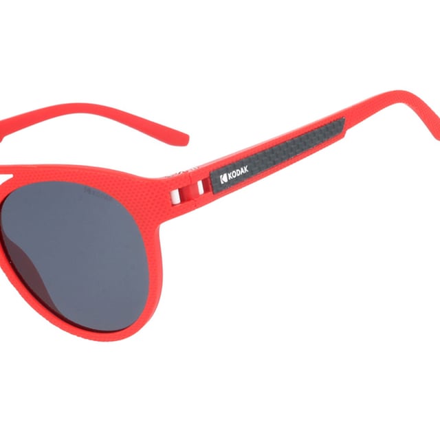If you like to wear the latest in fashion and accessories are vital for your overall image, don't miss out on the Kodak CF90010 Unisex Sunglasses.

 Shape and design:
 - Kodak sunglasses with a classic round shape and double bridge design.

 Frame Material:
 - The frame of these sunglasses is made entirely of Nylon TR90.

 Sideburns:
 - The temples are also made of nylon, matching the frame material.

 Brand details:
 - Kodak branding on temples.

 Glasses:
 - Polarized: No.
 - Progression allowed: Yes.
 - Graduation allowed: Yes.
 - 100% UV400 protection.

 The color of the sunglasses lenses may vary slightly from the images due to lighting effects or adjustments in the material finish, but they will always retain their style and quality!
 Measures: Lens height: 44 mm. Lens width: 50 mm. Bridge: 20 mm. Temples: 140 mm.
 Composition: Nylon TR90
 Care:
Use a microfiber cloth to clean the lenses and avoid scratches.