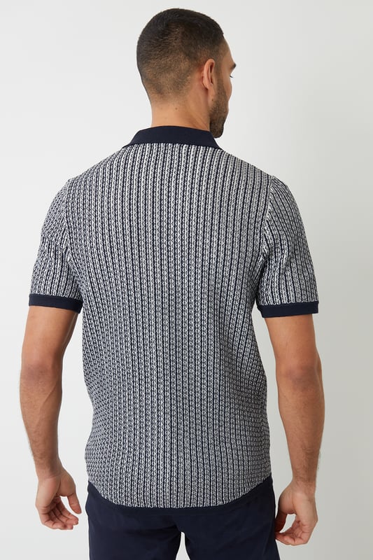 Upgrade your wardrobe this season with this stylish revere collar knitted shirt from Threadbare. This short sleeve knitted shirt has a Milano knit revere collar, placket and tubular cuffs and hem. Complete with full button-down fastening for easy styling. In a textured stripe knit and finished with the Threadbare metal branding tab above the hem. Pair with chino shorts for an effortless summer aesthetic that's great for outings, or make it date night appropriate with a pair of dark denim jeans and trainers.