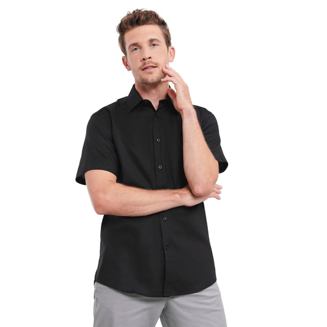 70% Cotton, 30% Polyester. Design: Plain. Fastening: Button. Neckline: Collared. Sleeve-Type: Short-Sleeved. Curved Hem. Length: R.