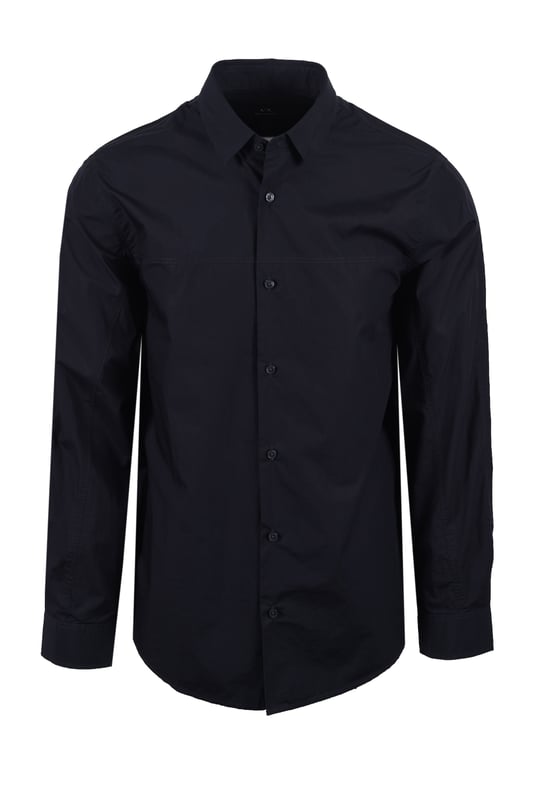 Armani Exchange Long Sleeved Shirt in Deep Navy
Elevate your wardrobe with the Armani Exchange Deep Navy Long-Sleeved Cotton Poplin Shirt. This regular-fit shirt is the epitome of classic style, offering a refined look suitable for any occasion.
 
Crafted from premium cotton poplin, this shirt provides exceptional freshness and comfort, while maintaining a crisp, structured appearance throughout the day. The deep navy hue adds a touch of understated sophistication, making it a versatile staple for both professional and casual settings.
 
Features

Fabric: 100% Cotton
Regular Fit
Cotton Poplin Fabric
Classic Collar
Cuffs with Slit
Back Yoke
Style code: XM000374