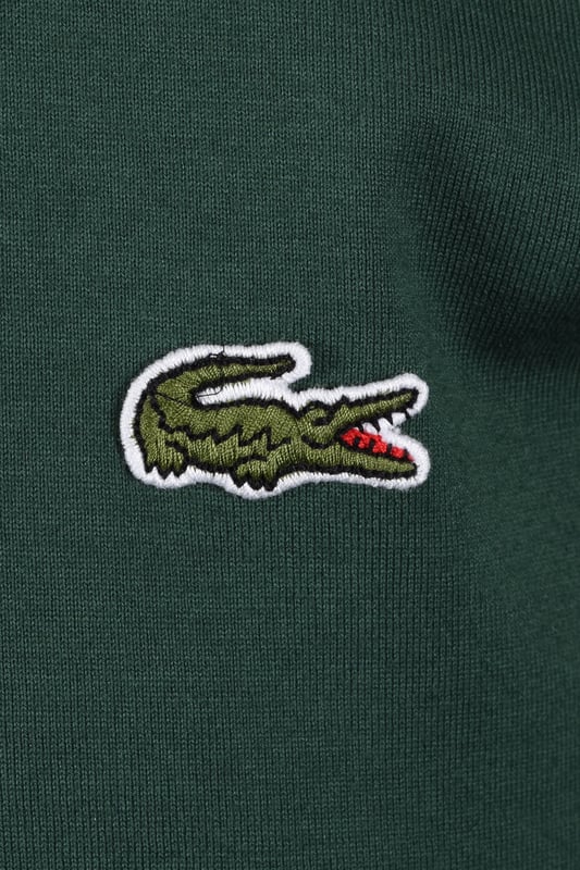 Lacoste Tipped T-shirt Green Lacoste Tipped T-shirt in Green
Elevate your casual wardrobe with the Lacoste Tipped T-Shirt in classic green. This versatile piece offers a perfect blend of style, breathability, and comfort, making it an ideal choice for any occasion. Whether you're catching up with friends on the weekend or heading to work, this t-shirt will quickly become your go-to staple.
Features
Classic Lacoste Design: Showcasing the iconic Lacoste branding, this t-shirt exudes timeless style.
Intricate Detailing: The tipped trims add a touch of sophistication and visual interest.
Premium Quality: Crafted from 100% breathable cotton, ensuring all-day comfort.
Versatile Style
Style code: TH9903