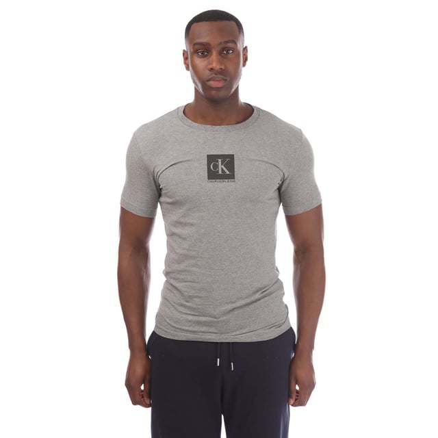 Mens Calvin Klein Monogram Logo T-Shirt in grey.- Ribbed crew neck.- Short sleeves.- Calvin Klein Jeans logo.- Regular fit.- 94% Cotton  6% Elastane.- Ref: J30J314755PF2