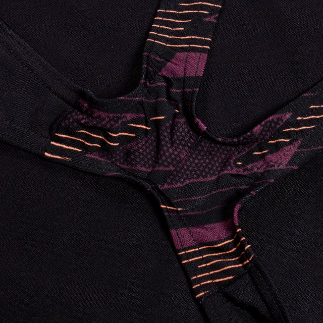 Womens Speedo Hyperback Splice Muscleback Swimsuit in black.Make a statement in HyperBoom logo prints. Paying homage to our legacy graphics  this sporty black Muscleback features flattering shaped side panel splices of our evolutionary HyperBoom logo print in intense shades of fluro red and purple. The muscleback design and medium leg offer flexibility and freedom of movement  so you can rock your workout in comfort. Made from our durable Endurance+ fabric  it's quick-drying and chlorine-resistant. Plus  the Polyester yarn in this fabric is made from 100% post-consumer waste.Ref: 81347017597Please note that returns will only be accepted if the hygiene label is still attached to the product.