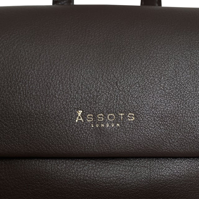A stylish backpack in our exclusively developed soft milled leather. The unique shape and minimalistic design is ideal for travel and day to day use. A full grain leather bag that provides the space and ease to carry items such as tablets, ipads, notebooks, purses and much more... A hidden button with adjustable tab gives security and allows to maintain the shape of your 'Jermyn' medium-sized full grain leather backpack.
Top grab handle. Lightweight. Fits ipads and tablets. Flap magnet closure. Additional internal adjustable tab for security and space. Adjustable shoulder handle. Adjustable leather shoulder strap. Internal utility features, include: Zip pocket. Fittings colour: Clean Brass. Composition: Body: 100% Genuine Leather. Lining: 100% Cotton.
DISCLAIMER : All pictures shown are for illustration purpose only. Actual product colour may vary due to different ambience lighting or the screen display settings. Size- W27.5cm x H30cm x D16cm.