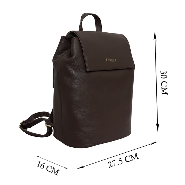 A stylish backpack in our exclusively developed soft milled leather. The unique shape and minimalistic design is ideal for travel and day to day use. A full grain leather bag that provides the space and ease to carry items such as tablets, ipads, notebooks, purses and much more... A hidden button with adjustable tab gives security and allows to maintain the shape of your 'Jermyn' medium-sized full grain leather backpack.
Top grab handle. Lightweight. Fits ipads and tablets. Flap magnet closure. Additional internal adjustable tab for security and space. Adjustable shoulder handle. Adjustable leather shoulder strap. Internal utility features, include: Zip pocket. Fittings colour: Clean Brass. Composition: Body: 100% Genuine Leather. Lining: 100% Cotton.
DISCLAIMER : All pictures shown are for illustration purpose only. Actual product colour may vary due to different ambience lighting or the screen display settings. Size- W27.5cm x H30cm x D16cm.