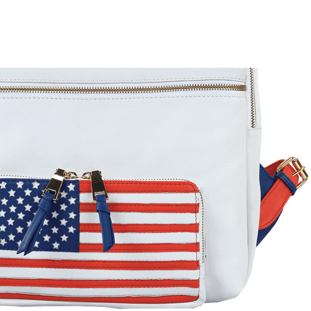 The 'Washington' White Leather Laptop Backpack is made of full grain real leather and boasts shiny gold hardware. With credit card slots, two way zippers, and a zip pocket in the front, it's both stylish and multi-functional for all your needs. Upgrade your everyday carry with this luxurious designer backpack.
Outstanding US stripe and star logo on the front pocket. Two way shiny gold zip top opening. Two zipped pockets on the front. Top grab handle. 15 inch laptop and tablet compartments and slip-in pockets. Multi-purpose use and a travel companion. Internal features, include: Credit card pockets. Leather encased mirror. Key ring holder. Mobile holder. Fittings: Gold. Composition: Body: 100% Genuine Leather. Lining: 100% Polyester.
DISCLAIMER : All pictures shown are for illustration purpose only. Actual product colour may vary due to different ambience lighting or the screen display settings. Size- W30cm x H39cm x D12cm.