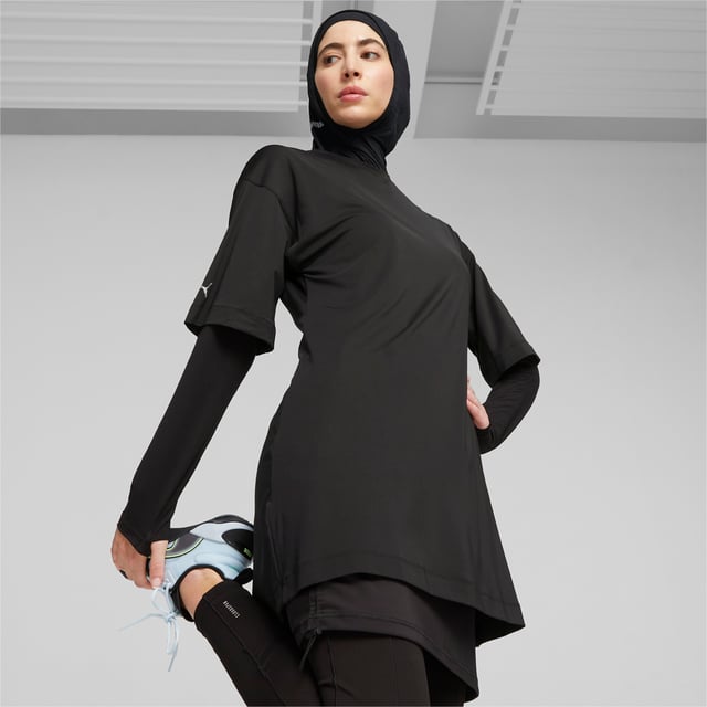 PRODUCT STORY: Go undercover in this loose-fitting tee from PUMA's Modest collection. Designed for fitness fans who prefer to celebrate the body's function over form, its relaxed design is ideal for staying comfortable and casual at the studio or on the go. FEATURES & BENEFITS: Recycled Content: Made with at least 70% recycled material as a step toward a better future.; dryCELL: Performance technology designed to wick moisture from the body and keep you free of sweat during exercise. DETAILS: Regular fit; Crew neck; Short sleeves; Single jersey fabric; Long body.