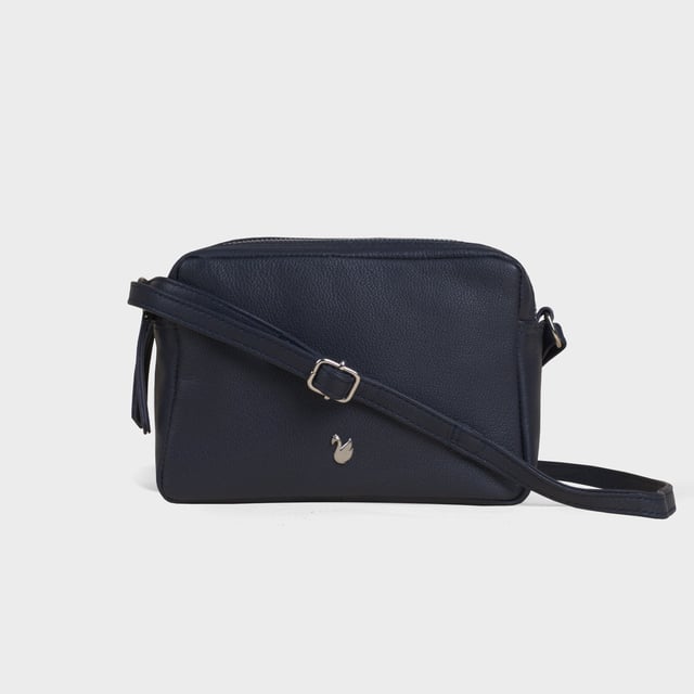 Redefine elegance with the ‘Avon’ soft Nappa leather crossbody bag, a perfect fusion of luxury, craftsmanship, and practicality. Expertly handcrafted from the finest full-grain soft Nappa leather, this premium bag is designed for those who appreciate timeless sophistication and effortless style. Whether you're heading to work, a casual outing, or an evening event, the ‘Avon’ crossbody bag is your go-to accessory for effortless sophistication and refined style. Premium Full-Grain Nappa Leather – Crafted from the softest and most supple genuine leather, offering a luxurious touch and exceptional durability. Smart & Functional Design – Double zipped compartments for easy organisation and secure storage. Spacious interior to accommodate your daily essentials with ease. Adjustable Leather Shoulder Strap – Designed for custom comfort, allowing you to wear it as a crossbody or shoulder bag. Lightweight & Versatile – A perfect everyday companion, seamlessly blending style and functionality. Signature Assots ‘Swan’ Collection – Embellished with the iconic ‘Swan’ logo, symbolising elegance, grace, and superior craftsmanship. Additional Internal Features - Slip-in pocket for your mobile phone, car keys and house keys. Fittings Colour: Silver. Composition: Body: 100% Genuine Leather, Lining: Polyester. Size: 14cm x 20cm x 7cm