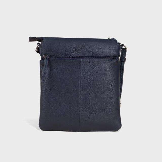 The ‘Amba’ soft Nappa leather crossbody bag blends luxury, craftsmanship, and practicality in a timeless design. Handcrafted from premium full-grain Nappa leather, it’s the perfect companion for work, casual outings, or evening events. Elegant yet versatile, this bag exudes refined sophistication while offering effortless style and functionality. Premium Full-Grain Nappa Leather – Crafted from the softest and most supple genuine leather, offering a luxurious touch and exceptional durability. Smart & Functional Design – Secured zip opens to a roomy main compartment for easy organisation and secure storage. Fully lined with fresh cream polyester fabric to easily spot your essentials. Mulitpockets - Magnetic fastening flap pocket to easily slide in your essentials. Secured back zip pocket provides extra room to organise when you're out and about. Adjustable Leather Shoulder Strap – Designed for custom comfort, allowing you to adjust the length of the strap to suit your needs. Lightweight & Versatile – A perfect everyday companion, seamlessly blending style and functionality. Signature Assots ‘Swan’ Collection – Embellished with the iconic ‘Swan’ logo, symbolising elegance, grace, and superior craftsmanship. Additional Internal Features - Secured zip pocket for your mobile phone, car keys and house keys. Fittings Colour: Silver. Composition: Body: 100% Genuine Leather, Lining: Polyester. Size: 24cm x 21cm x 1.5cm