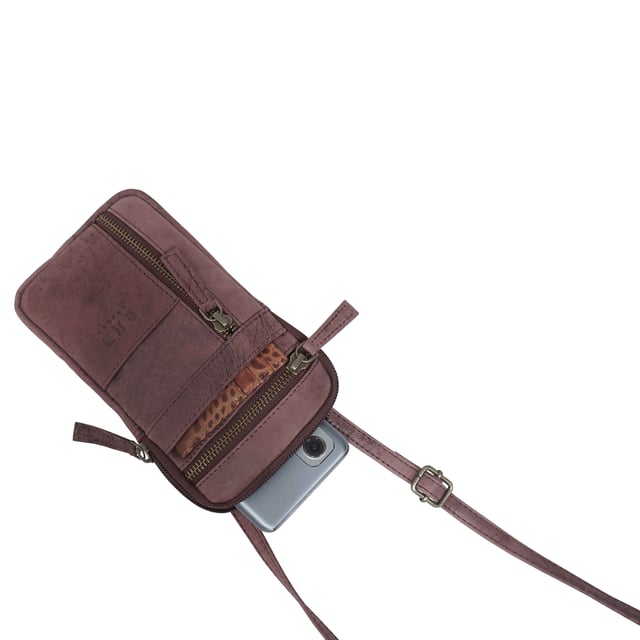 'BROOKE' Real Leather Mobile Phone Crossbody Bag Introducing 'Brooke', the perfect companion for the urban life. Beautifully handcrafted from real leather and with adjustable shoulder handles, its timeless finesse and multi-pocketed design is both elegant and practical, allowing you to move around with effortless grace. The ideal travel crossbody phone bag for everyday use.
One main zip pocket compartment to fit in your daily essentials. Two front zip pockets to slide in your house keys, car keys and more. Front slip pocket to slide in your cardholder. Full length zip pocket at the back to slide in your credit cards, membership cards and more. Adjustable leather shoulder handles for a comfortable carry. Fittings Colour: Antique Brass. Composition: Body: 100% Genuine Leather. Lining: Polyester Mix.
DISCLAIMER : All pictures shown are for illustration purpose only. Actual product colour may vary due to different ambience lighting or the screen display settings. Size- W10.5cm x H18.5cm x D2cm.